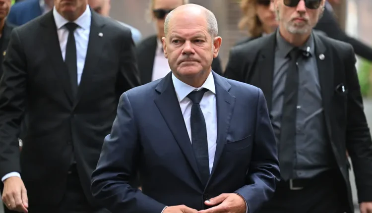 Federal Chancellor Olaf Scholz during a visit to Solingen, Germany - AP