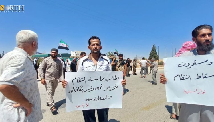 Protesters rejecting opening Abu al-Zandain crossing between government-controlled areas and opposition- held ones in northwestern Syria – North Press