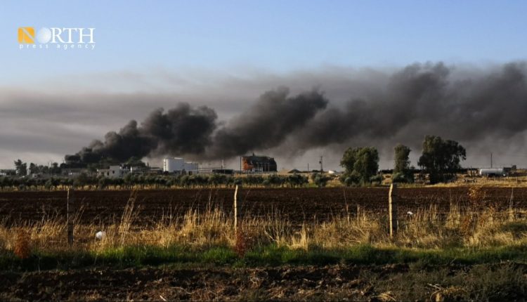 Smoke rising from the Awda oil field in the town of Tribe Spiyeh (al-Qahtaniya) in the eastern countryside of Qamishli, Northeast Syria, Oct. 24, 2024 – North Press