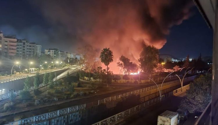 Fire burning in a building following an Israeli airstrike on the Kafr Souseh neighborhood in the Syrian capital Damascus on Oct. 24, 2024.