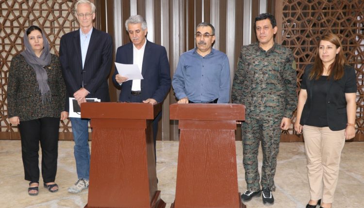 Leaders from the Kurdish National Council (ENKS) and the Democratic Union Party (PYD) meet in Hasakah, northeast Syria, to discuss Kurdish unity efforts.