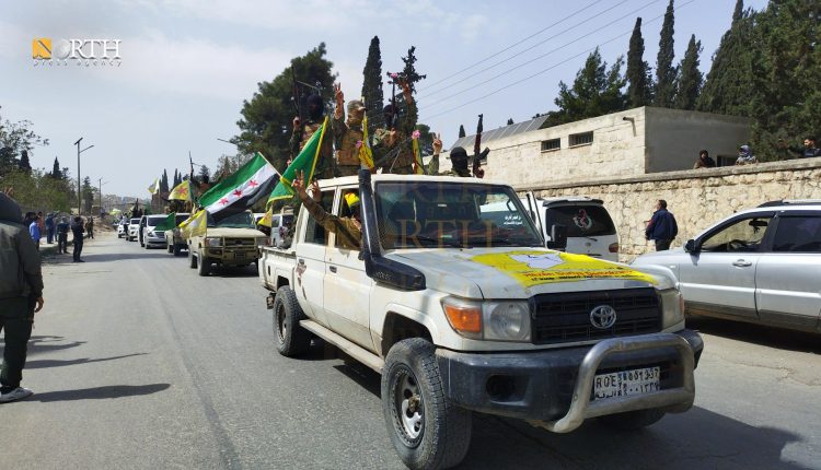 A convoy of YPG fighters departing Kurdish neighborhoods in Aleppo as part of a local agreement with the Syrian government – North Press