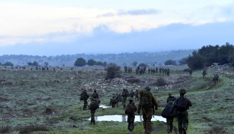 Israeli soldiers take part in training session near the Israel border with Syria at the Israeli-occupied Golan Heights, Feb. 1, 2024 – Reuters