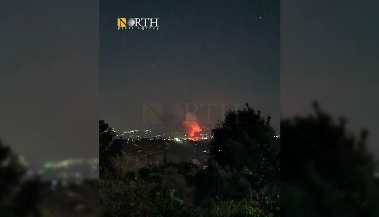 Civil defense teams battle fires after reported Israeli strikes on a military site near Jableh, western Syria, Aug. 6, 2025