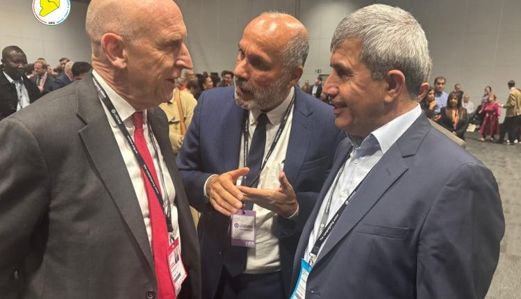 Hassan Mohammed Ali, head of the SDC’s Public Relations Office with British Defence Secretary John Healey during the conference of the British Labour Party on Sep. 28, 2025. - SDC