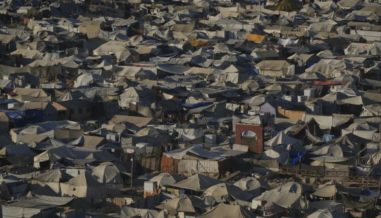 A makeshift tent camp for displaced Palestinians stretches across an area near the shore in Gaza City, Sept. 1, 2025 – AP