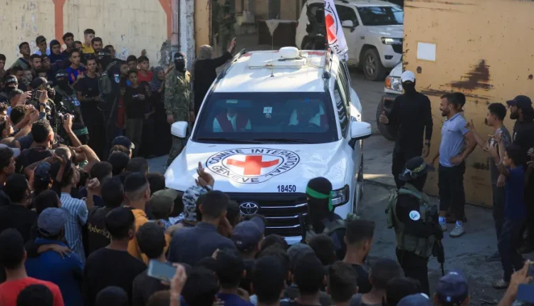 The ICRC supervises the delivery of Israeli hostages and Palestinian detainees on Oct. 13, 2025 – Reuters