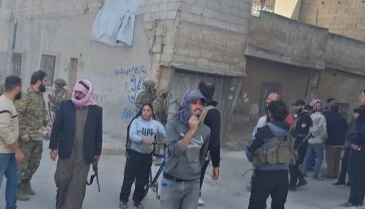 Residents and tribe members gather in a tense Homs street, Syria, after the killing of a Bani Khaled couple in nearby Zaidal on Nov. 23, 2025. – SOHR