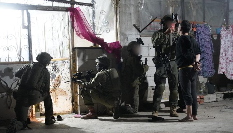 Troops of the 55th Reserve Paratroopers Brigade detain a suspect in the southern Syrian village of Beit Jinn on Nov. 28, 2025. – IDF