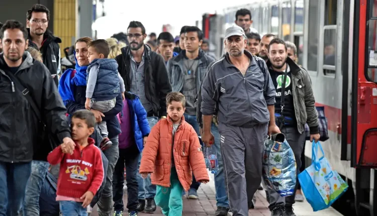 Refugees from Syria arrive at the train station in Dortmund, Germany, on Sept. 6, 2015. – AP