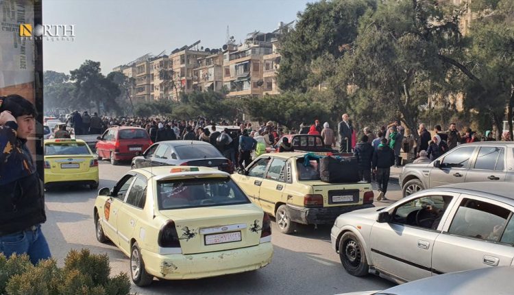 Residents leave homes in Aleppo's Kurdish neighborhoods of Sheikh Maqsoud and Ashrafiyeh on Jan. 7 after government attacks. – North Press