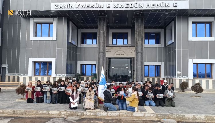 Kurdish students in AANES's Kobani University release a statement on Feb. 8, 2026 condemning the Jan. 25 assault that killed and injured 10 members of a family. – North Press