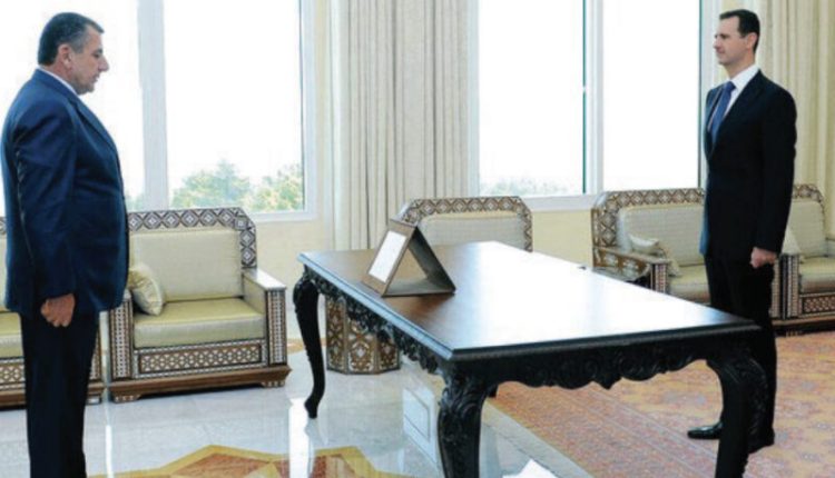 Samir Ousman Alsheikh, who was the head of Adra Prison near Damascus, and former Syrian President Bashar al-Assad in an undated photo. – U.S. Department of Justice via Courthouse News