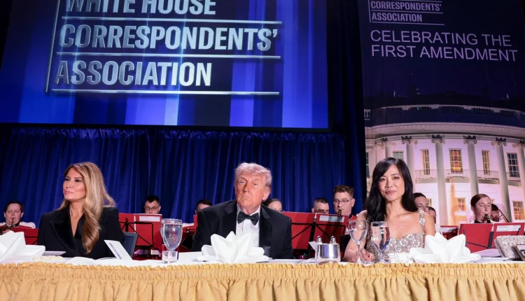 U.S. President Donald Trump, first lady Melania Trump and CBS News Senior White House correspondent Weijia Jiang at the White House Correspondents' Association dinner in Washington, D.C., on April 25, 2026. – Reuters