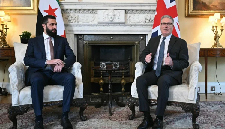 Syria's Transitional President Ahmad al-Sharaa is welcomed by Britain's PM Keir Starmer ahead of their meeting at 10 Downing Street in central London on March 31, 2026. – AFP