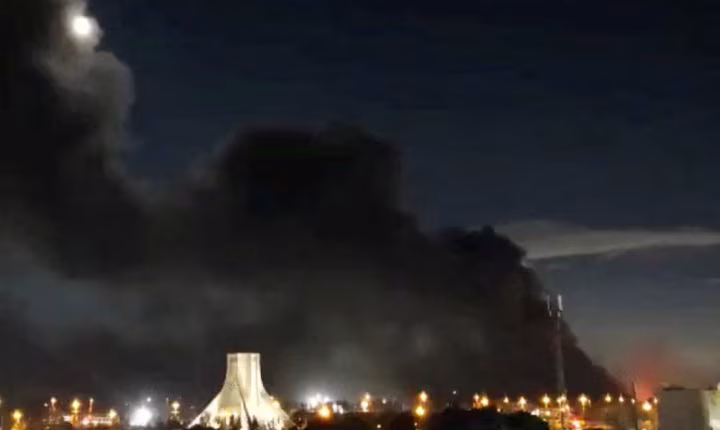 Smoke rises over Azadi Square following a strike, amid the U.S.-Israeli conflict with Iran, in Tehran, Iran, April 6, 2026. – Reuters