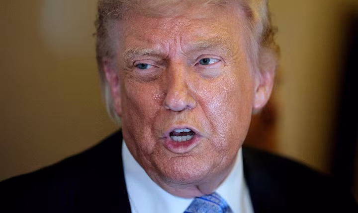 U.S. President Donald Trump speaks to the press aboard Air Force One en route to the U.S. following his official visit with President Xi Jinping in China on May 15, 2026. – Reuters