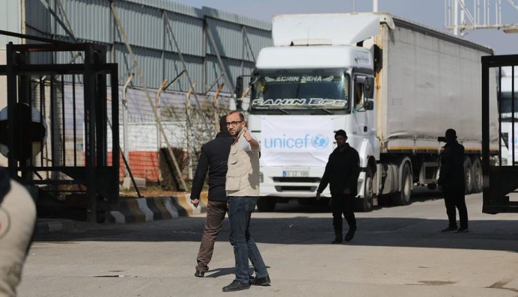 Trucks carrying essential humanitarian supplies travel from Turkey through the Bab al-Salama border crossing, into northwest Syria. – UN