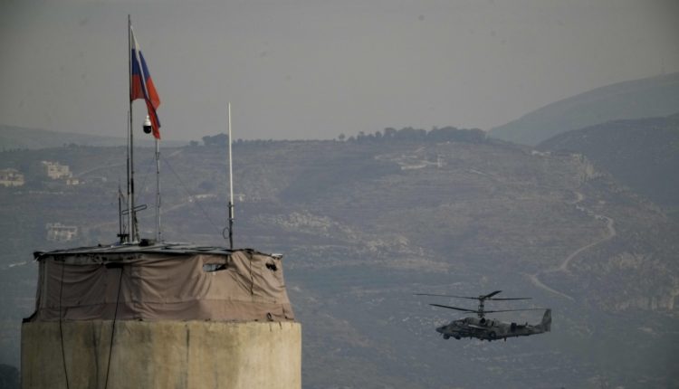 A Russian helicopter flying over an air base Moscow maintains in Syria in 2024. – AP