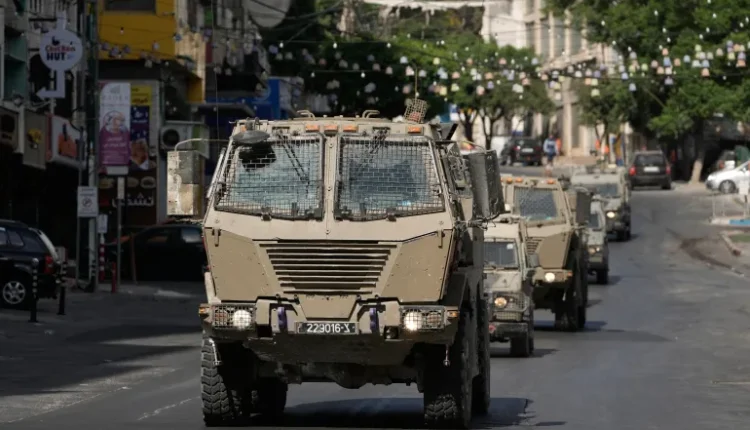 A convoy of Israeli armored vehicles in the West Bank city of Nablus on July 26, 2026. – AP