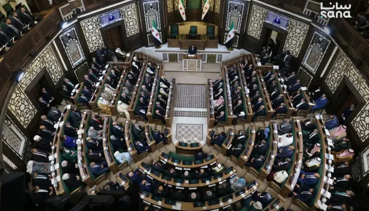 Syria's President Ahmad al-Sharaa speaks during the first meeting of Syria's new transitional parliament in Damascus on July 12, 2026. – SANA