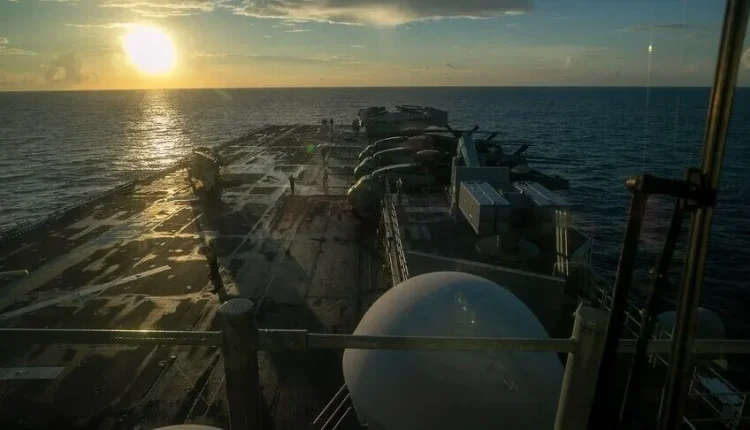 U.S. Sailors and Marines aboard USS Tripoli arriving in the Central Command area of responsibility on March 27, 2026. – AP