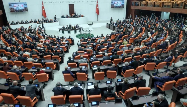 Lawmakers take part in a voting session on a bill offering limited amnesty for Kurdish PKK militants at the Grand National Assembly of Turkey in Ankara on Aug. 10, 2026. – AFP