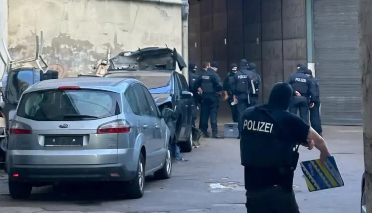 German policemen raiding Syrian migrant-smuggling networks on Aug. 5, 2026. – Europol