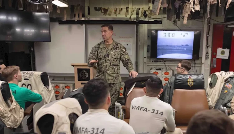 A screenshot via CENTCOM on X shows Adm. Brad Cooper speaks with sailors and Marines on the USS Abraham Lincoln on Aug. 15, 2026.
