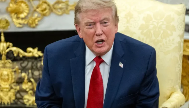 U.S. President Donald Trump speaks as he meets with lifeguard Ryder Williams in the Oval Office of the White House in Washington, DC, on Aug. 17, 2026. – AFP