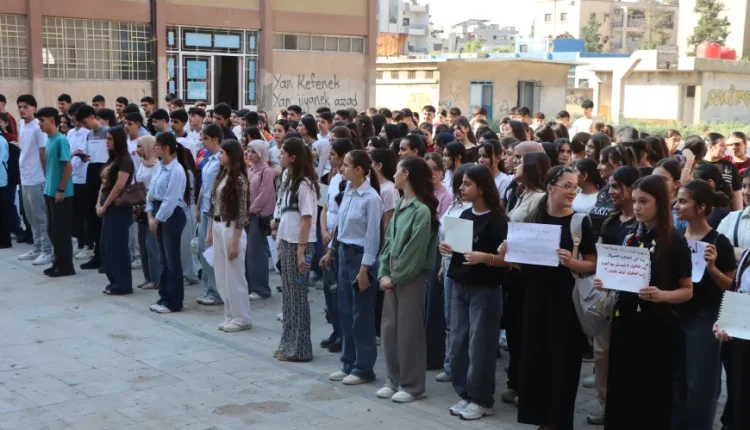 Kurdish students at a school in Hasakah, northeastern Syria, hold banners demanding their right to study in their mother tongue, Sept. 7, 2026. – ANHA