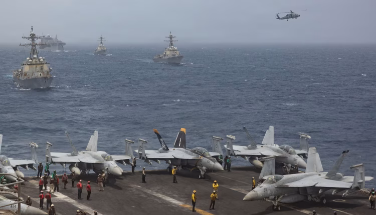 U.S. Navy warships transit the Arabian Sea in close formation, June 30, 2026. – U.S. Navy