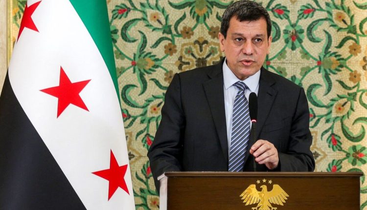 Mazloum Abdi, former Commander in Chief of the Kurdish-led SDF, speaks during a televised speech at the People's Palace in Damascus on Aug. 25, 2026. - AFP