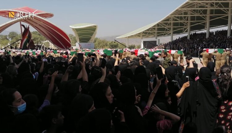 بەشێک لە مەراسیمی ناشتنەکە بە کامێرای نۆرس پرێس