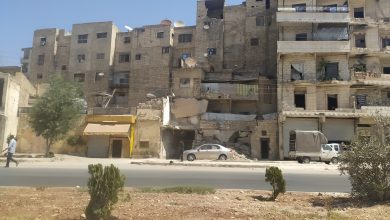 مبان سكنية تهدمت أجزاء منها في حي صلاح الدين بمدينة حلب- نورث برس