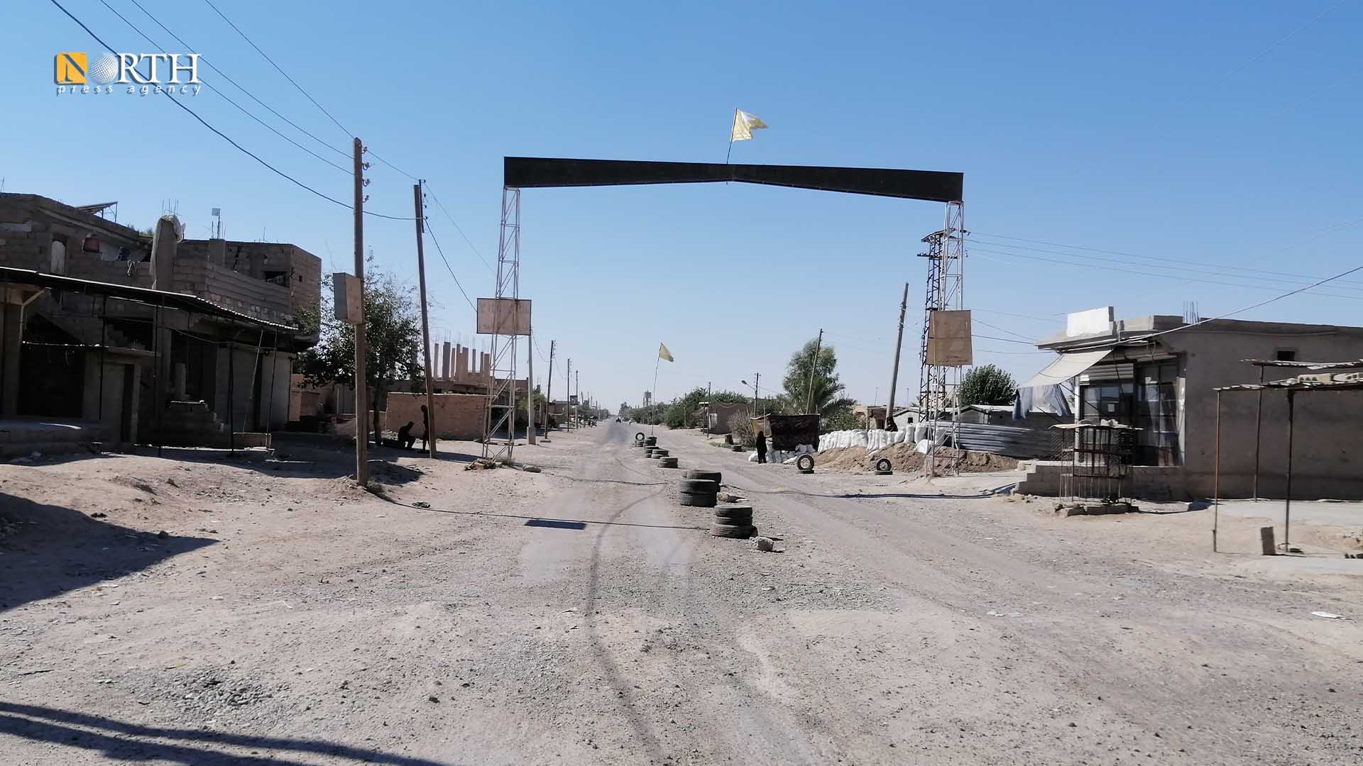 المدخل الغربي لبلدة الجرذي شرقي دير الزور- نورث برس