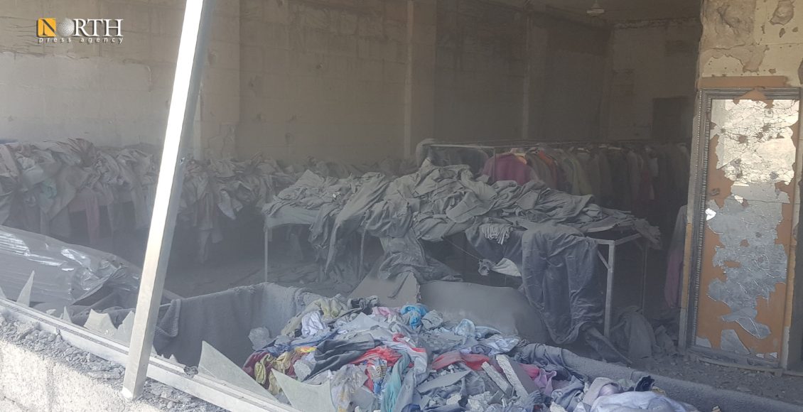 آثار الدمار في أحد المحال التجارية في كوباني جراء القصف التركي – نورث برس
