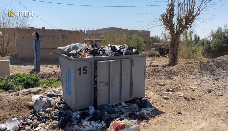 حاوية ممتلئة بالنفايات في بلدة البحرة شرقي دير الزور- نورث برس