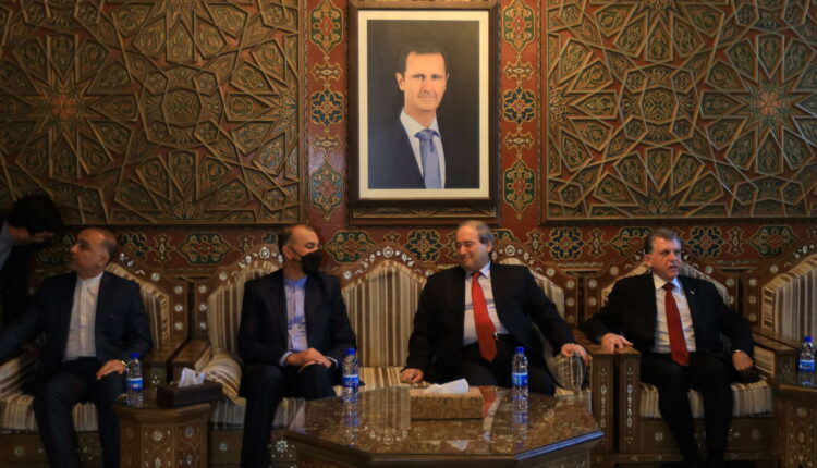 وزير الخارجية السوري ونظيره الإيراني
