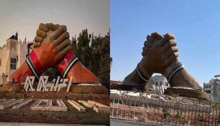 العلم التركي يرسم على دوار الكفين في أعزاز