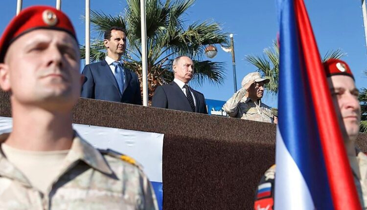 الرئيس السوري بشار الأسد مع الروسي فلاديمير بوتين في قاعدة حميميم - إنترنت