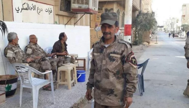 عناصر للأمن العسكري ببلدة البوكمال على الحدود السورية العراقية - متداول