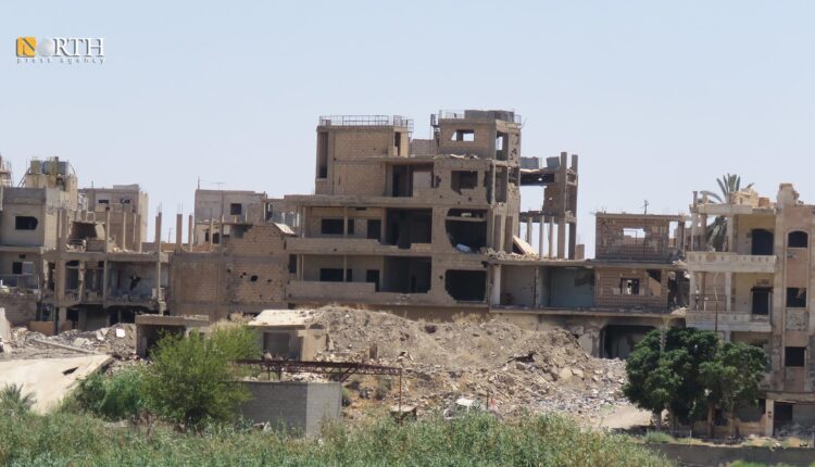 أبنية متضررة من الحرب ببلدة الميادين بريف دير الزور الشرقي - نورث برس