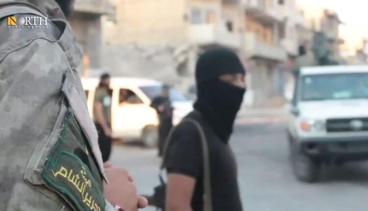 عناصر لأمنية هيئة تحرير الشام في إدلب - نورث برس