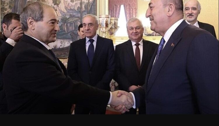 وزير الخارجية السوري فيصل مقداد مع نظيره التركي سابقاً مولود جاويش أوغلو