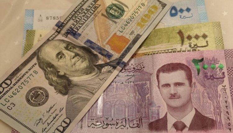 فئات نقدية من الدولار والليرة السورية