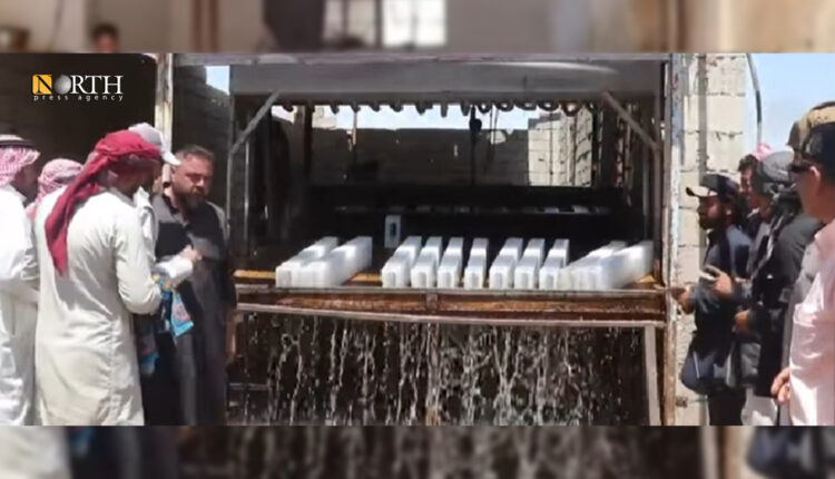 معمل ثلج في بلدة الكرامة شرقي الرقة - نورث برس.jpg