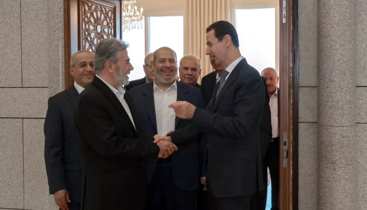 الرئيس السوري بشار الأسد مع وفد من حركة حماس