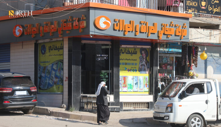 شركة صرافة وحوالات في بلدة كركي لكي غرب ديرك أقصى شرقي سوريا - نورث برس