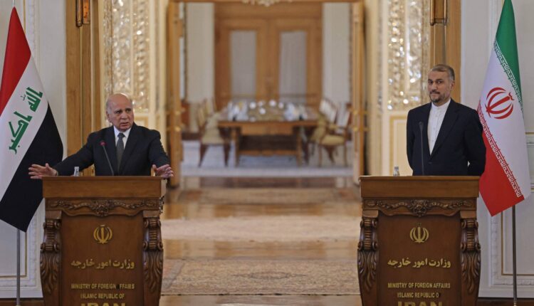 وزيرا الخارجية الإيراني والعراقي خلال مؤتمر صحفي في طهران